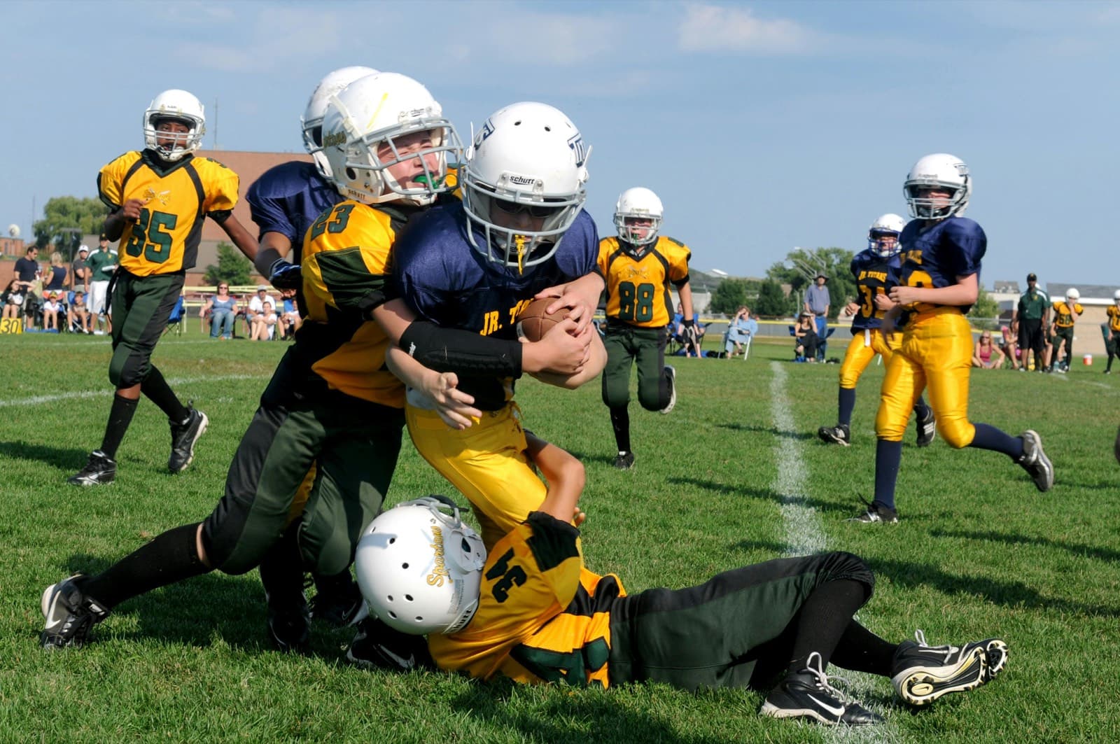 Youth football team in action